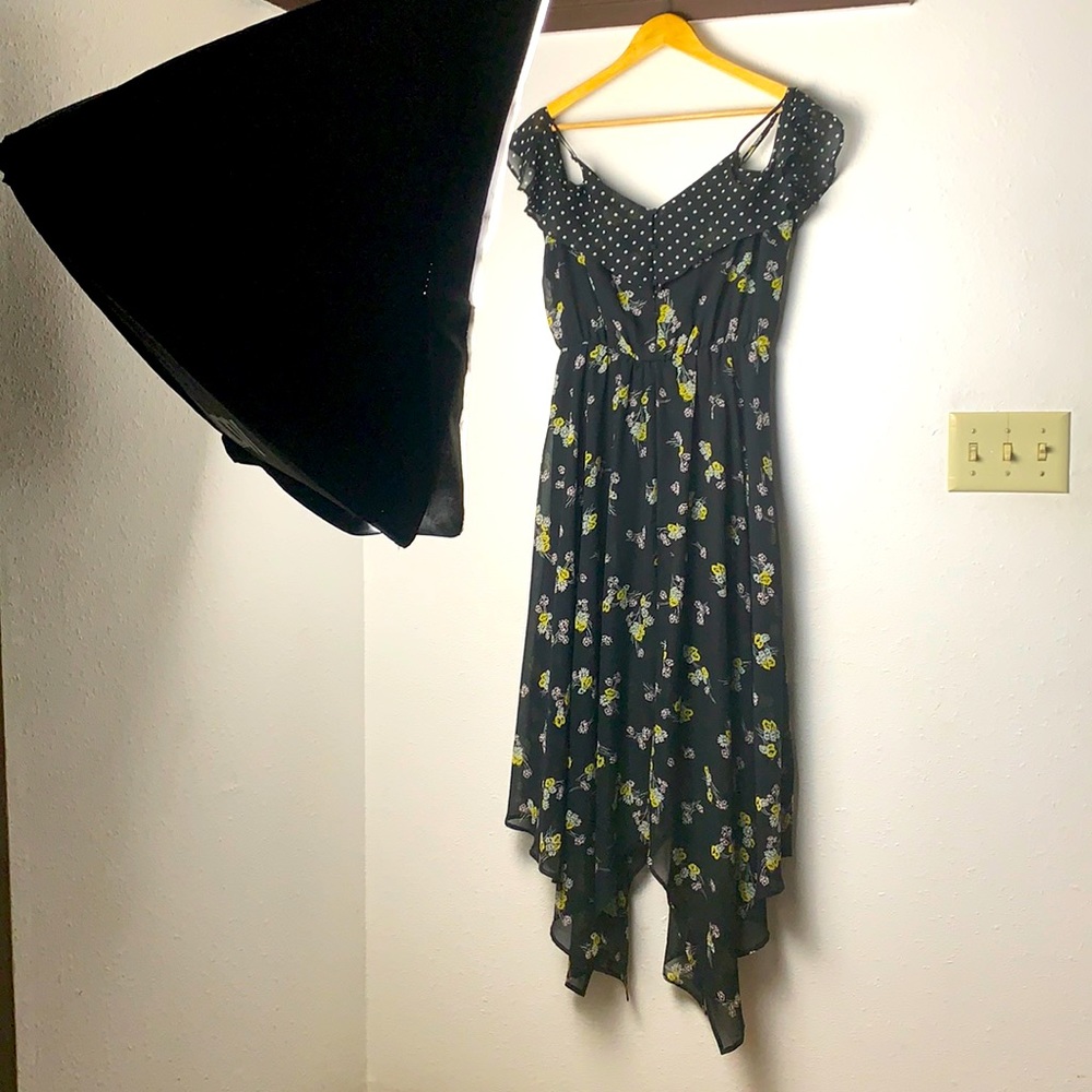 Long dress with cap sleeves and hanker chief hem